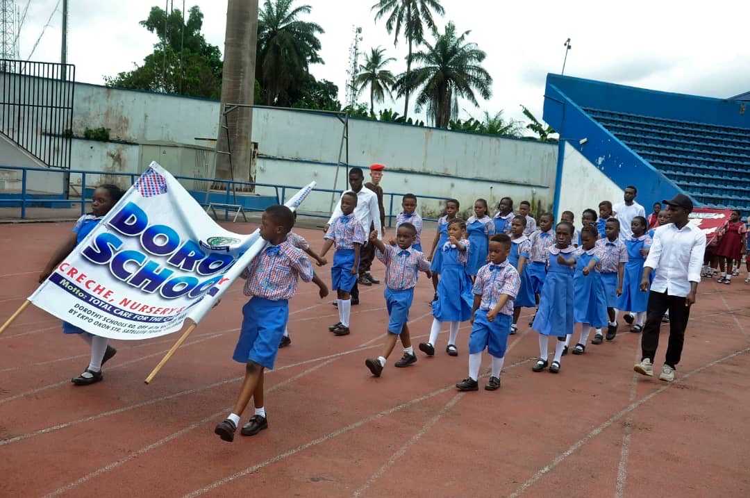 Dorothy students marching past the track
